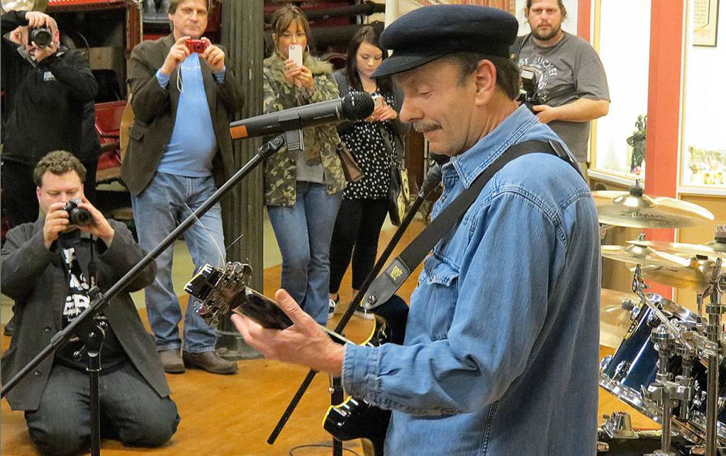 COURTESY RUSSELL BROOKS 
Warren Mason plays at the Aberdeen Museum of History during Kurt Cobain Day in February 2014.