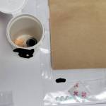 Detectives located numerous counterfeit prescription pills, believed to contain fentanyl, a loaded .380 handgun, along with cash and items consistent with the distribution and delivery of narcotics in a search of a West Aberdeen residence earlier this week. (APD Photo)
 Photo provided by Aberdeen Police Department