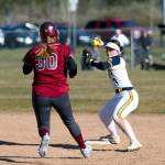 RYAN SPARKS | THE DAILY WORLD Aberdeen infielder Logan Glanz, right, records an out during the Bobcats 15-11 win over Hoquiam on Monday at Bishop Sports Complex in Aberdeen.