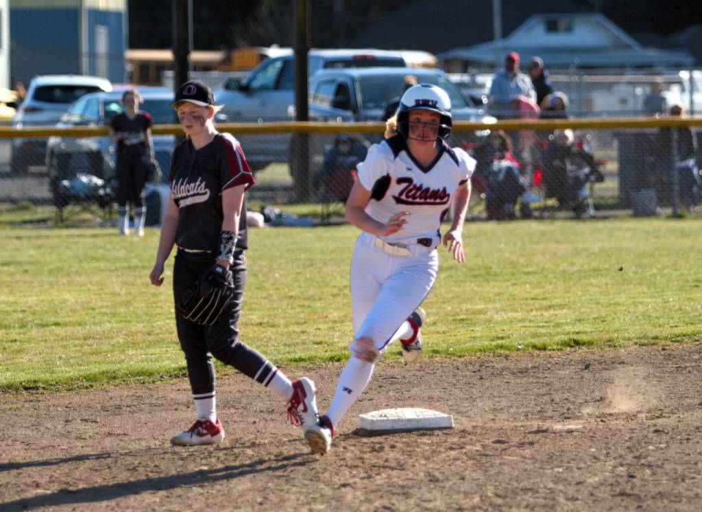 RYAN SPARKS | THE DAILY WORLD PWVs Grace Huber heads to third base during PWVs 19-0 win over Ocosta in Game 2 of a doubleheader on Tuesday in Pe Ell. The Titans had 16 hits in the three-inning victory.