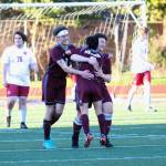 RYAN SPARKS | THE DAILY WORLD Montesanos Tucker Stecher, left, and Mateo Sanchez, right, embrace Yased Ramirez after Ramirez scored what turned out to be the game-winning goal over Hoquiam on Thursday in Montesano.