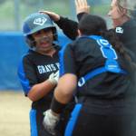 RYAN SPARKS | THE DAILY WORLD Grays Harbor College infielder Shaylee Bisbee, left, is congratulated by her teammates after belting a home run during the second game of a doubleheader against Centralia College on Wednesday in Aberdeen.