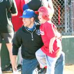 RYAN SPARKS | THE DAILY WORLD Grays Harbor College baseball player Tysen Richardson, an Elma High School graduate, and shares some smiles and laughs with Challenger Division player Scottland Ballew during Mondays game in Montesano.