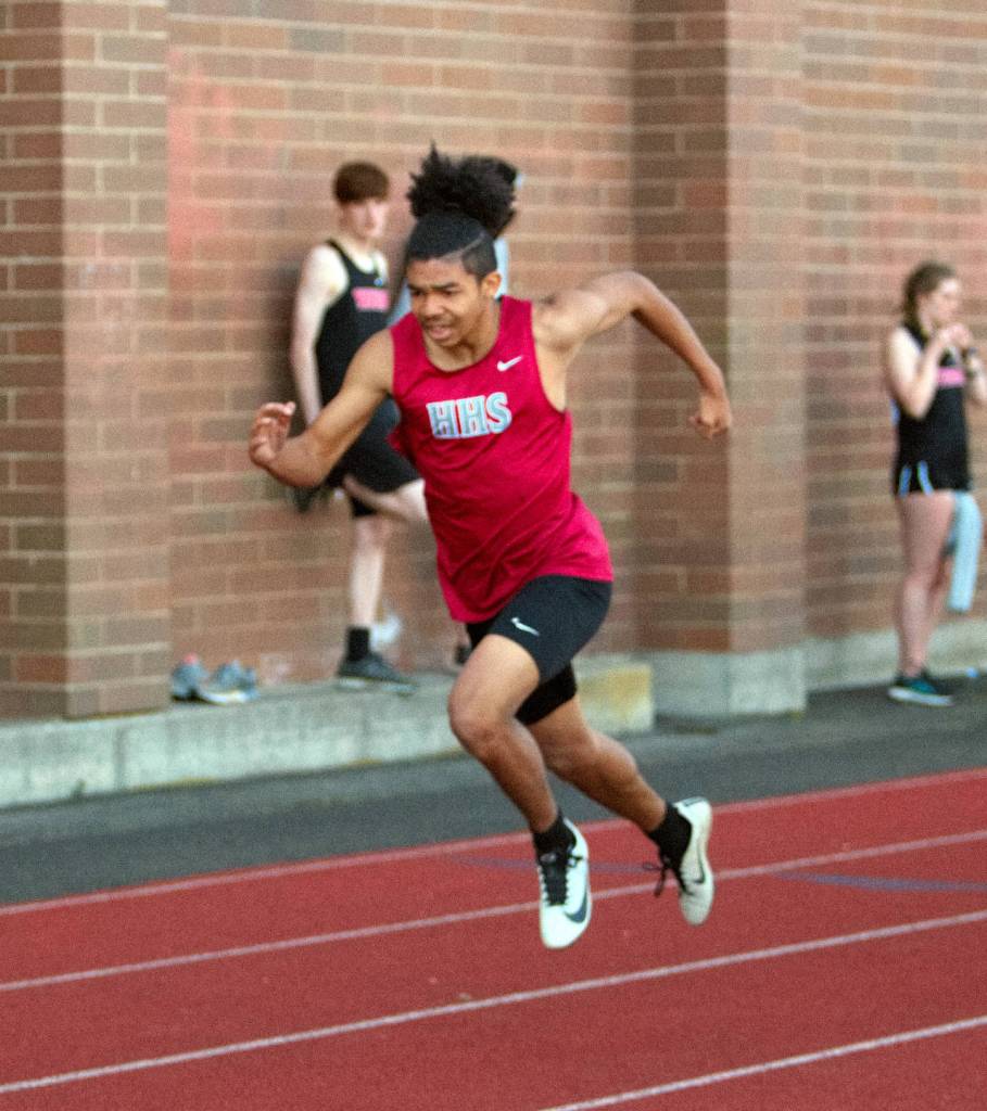 DAILY WORLD FILE PHOTO Hoquiams Giovanni Foster, seen here in a file photo, won district titles in both the 100 and 200 meter races at the 1A District 4 Championship meet on Friday in Vancouver.