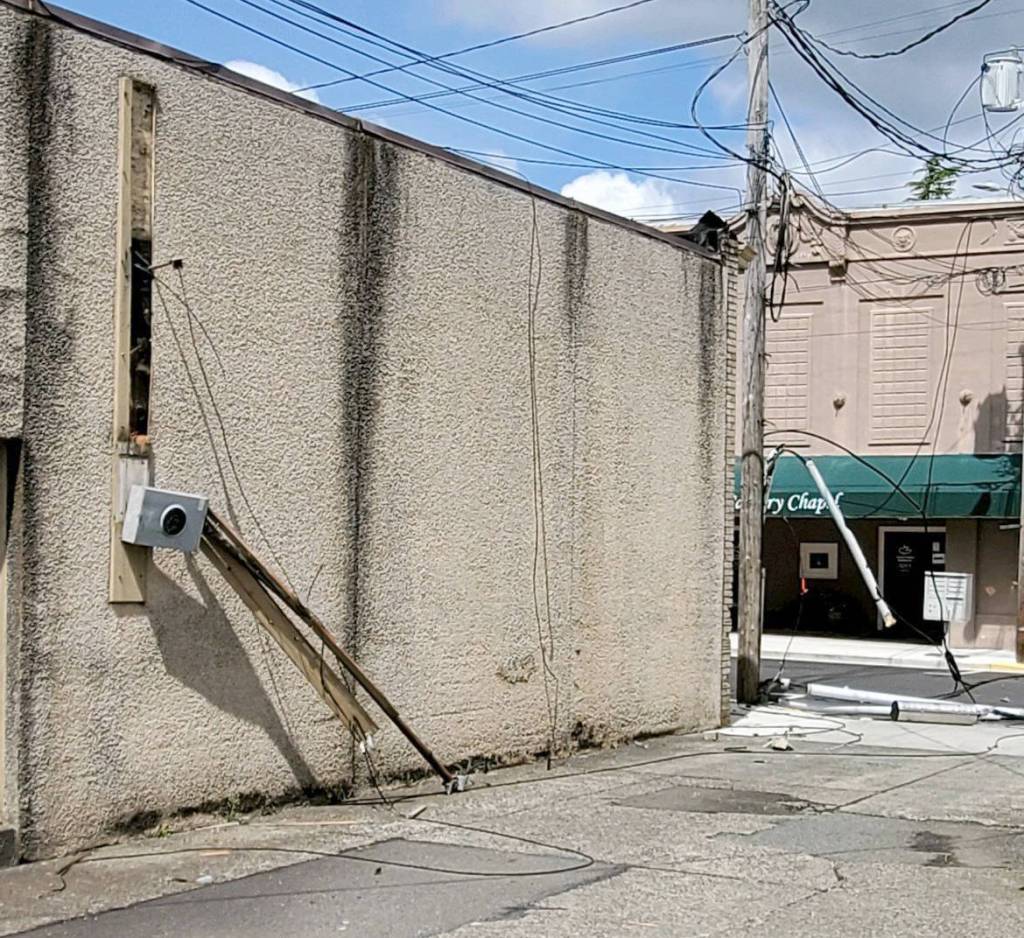 Damaged lines and buildings in downtown Montesano. Photo by Mark Cox