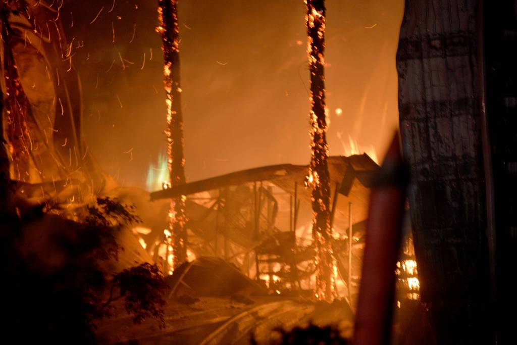 DAVE HAVILAND | THE DAILY WORLD
Fire destroys the spirit production building for Ocean’s Daughter Distillery, a subsidiary of Westport Winery