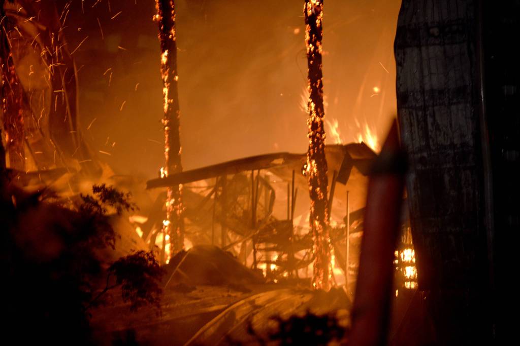 DAVE HAVILAND | THE DAILY WORLD
Fire destroys the spirit production building for Ocean’s Daughter Distillery, a subsidiary of Westport Winery