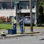 DAN HAMMOCK | THE DAILY WORLD 
State Patrol investigators at the scene of a high-speed motorcycle wreck on Lincoln Street in Hoquiam Tuesday afternoon. The driver, identified as James Cody Stearns, 30, of Hoquiam, was ejected and struck the mailbox at the feet of the trooper, left. The bike is visible to the right of the minivan in the background. Stearns was pronounced dead at the hospital at 1:10 p.m.
