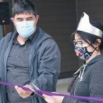 Larry Workman photo 
Quinault Indian Nation President Guy Capoeman and current Chief Taholah Days royalty Denise Curleybear cut the ribbon at the tribes new Generations House building Friday, May 14.