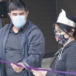 Larry Workman photo 
Quinault Indian Nation President Guy Capoeman and current Chief Taholah Days royalty Denise Curleybear cut the ribbon at the tribes new Generations House building Friday, May 14.