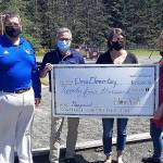 Courtesy photo 
The Elma PTA presented a $24,000 check May 14 for new playground equipment at Elma Elementary. The money was raised by Elma kids. Pictured from left are Elma Schools Superintendent Kevin Acuff, Elma Elementary Principal Mark Keating, Elma PTA Treasurer Darcy Dotson, and PTA President Kina Delimont.