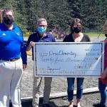 Courtesy photo 
The Elma PTA presented a $24,000 check May 14 for new playground equipment at Elma Elementary. The money was raised by Elma kids. Pictured from left are Elma Schools Superintendent Kevin Acuff, Elma Elementary Principal Mark Keating, Elma PTA Treasurer Darcy Dotson, and PTA President Kina Delimont.
