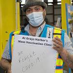 NIKKI GWIN PHOTO 
The last day of operations at the countys mass vaccination site at the Port of Grays Harbor was Friday. Daniel Hannawalt-Morales, Grays Harbor Public Health Vaccine and Testing Branch Director, was among the group of volunteers and staff that reflected on the many hours dedicated to vaccinating as much of the county as possible.