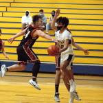 RYAN SPARKS | THE DAILY WORLD Aberdeens Angel Baltazar, right, makes a pass while being defended by Centralias Cameron Erickson during Mondays game in Aberdeen.