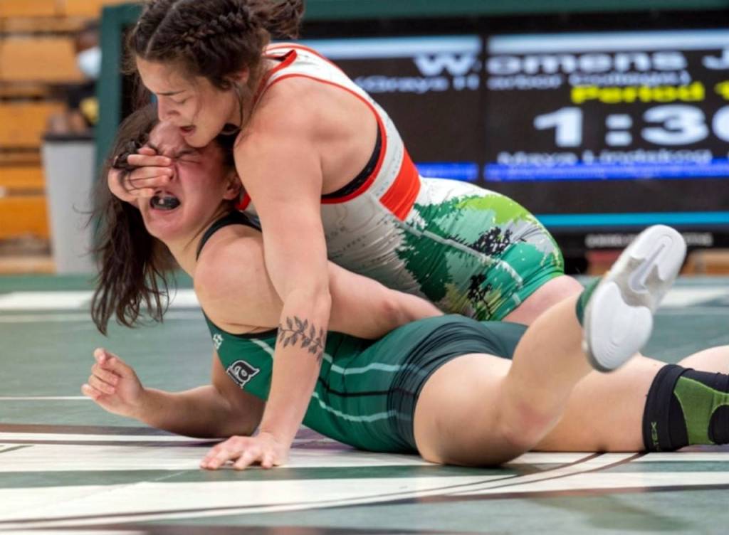 PHOTO COURTESY OF GRAYS HARBOR COLLEGE Grays Harbor wrestler Jocelyn Fierro works from the top position against against Umpqua Colleges Maya Lindskog during the third place match in the 136-pound weight class of the USA Wrestling Junior College National Championship for Women on Friday, May 14 in Roseburg, Oregon.