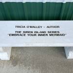 Courtesy International Mermaid Museum 
Author Tricia OMalley donated this bench to the International Mermaid Museum. OMalley is a long-time supporter of the Westport Winery, where the museum is located.