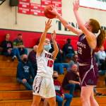ERIC TRENT | THE CHRONICLE Montesanos Zoee Lisherness (22) blocks a shot by Teninos Grace Vestal (10) during a 1A Evergreen Conference matchup Thursday in Tenino.