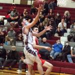 RYAN SPARKS | THE DAILY WORLD 
Montesano guard Colby Adams drives to the hoop for two of his game-high 16 points in the Bulldogs 41-38 loss to Tenino on Friday at Montesano High School.