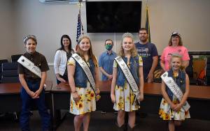 DAN HAMMOCK | THE DAILY WORLD 
McCleary Bear Festival royalty presented Mayor Brenda Orffer and members of the city council with 2021 Bear Festival pins Friday. Front row, from left, Jr. Prince Nathan Johnston, Sr. Queen Koral Young, Sr. Princess Taryn Ferrier, Jr. Princess Lola Van Blaricom. Back row, from left, Orffer, Councilman Jaron Heller, Councilman Brycen Huff, Councilwoman Joy Iversen.