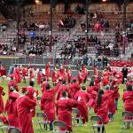 DAN HAMMOCK | THE DAILY WORLD 
Hoquiam High Schools newest class of graduates tosses its mortarboards into the air at the conclusion of the 2021 graduation ceremony at Olympic Stadium Sunday.
