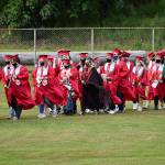 DAN HAMMOCK | THE DAILY WORLD
Soon-to-be Hoquiam High School graduates file into Olympic Stadium Sunday for the 2021 graduation ceremony.