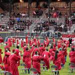 DAN HAMMOCK | THE DAILY WORLD 
Hoquiam High Schools newest class of graduates tosses its mortarboards into the air at the conclusion of the 2021 graduation ceremony at Olympic Stadium Sunday.