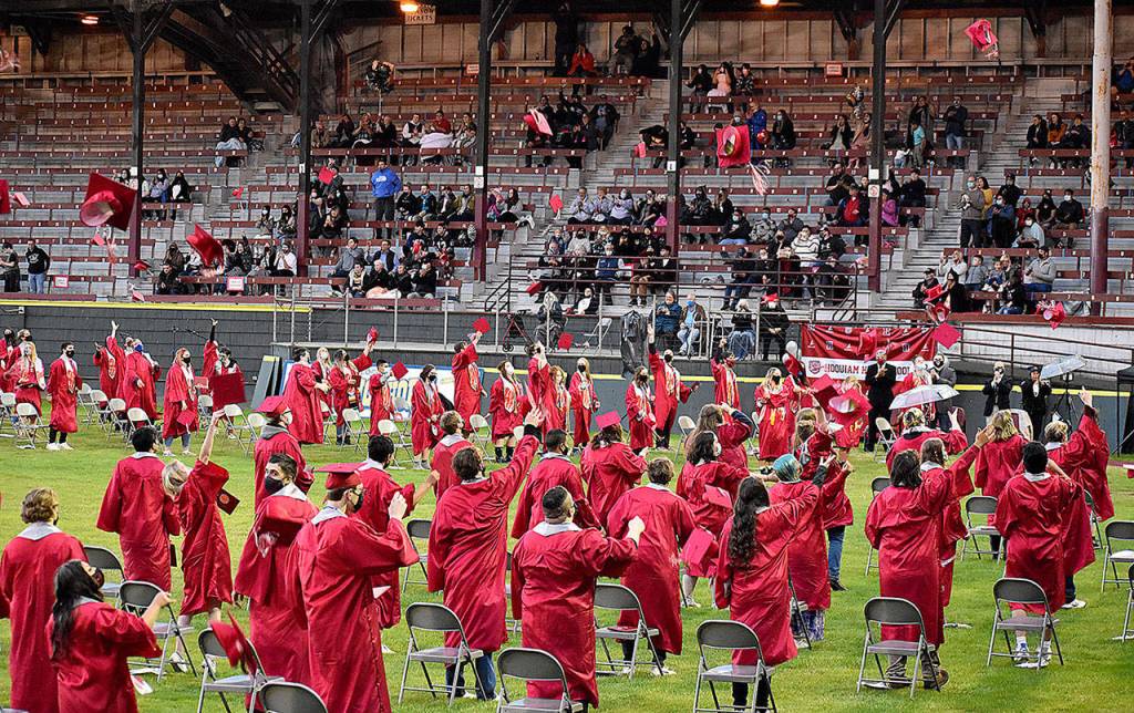 DAN HAMMOCK | THE DAILY WORLD 
Hoquiam High Schools newest class of graduates tosses its mortarboards into the air at the conclusion of the 2021 graduation ceremony at Olympic Stadium Sunday.