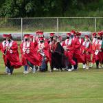 DAN HAMMOCK | THE DAILY WORLD
Soon-to-be Hoquiam High School graduates file into Olympic Stadium Sunday for the 2021 graduation ceremony.