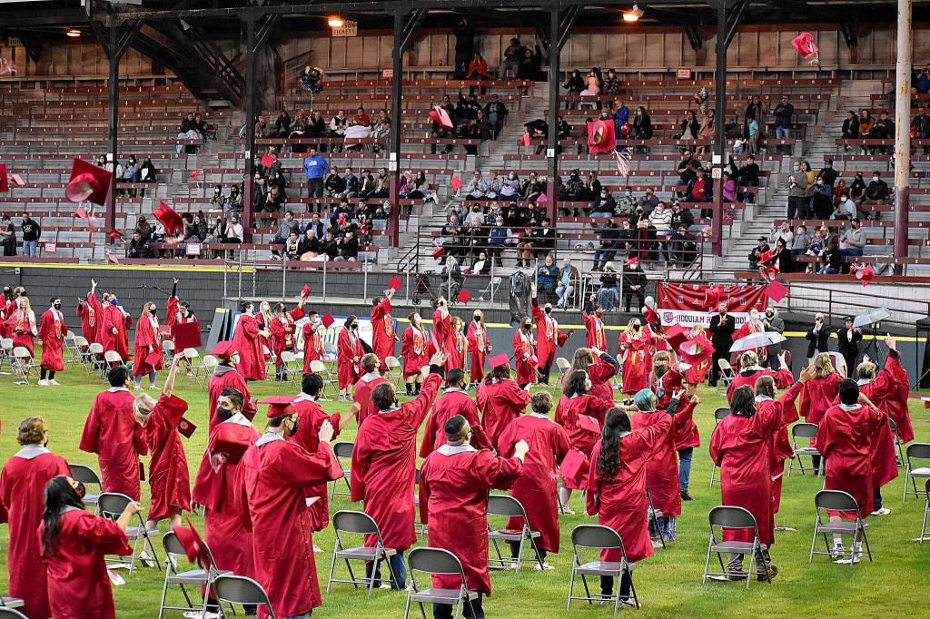 DAN HAMMOCK | THE DAILY WORLD 
Hoquiam High Schools newest class of graduates tosses its mortarboards into the air at the conclusion of the 2021 graduation ceremony at Olympic Stadium Sunday.
