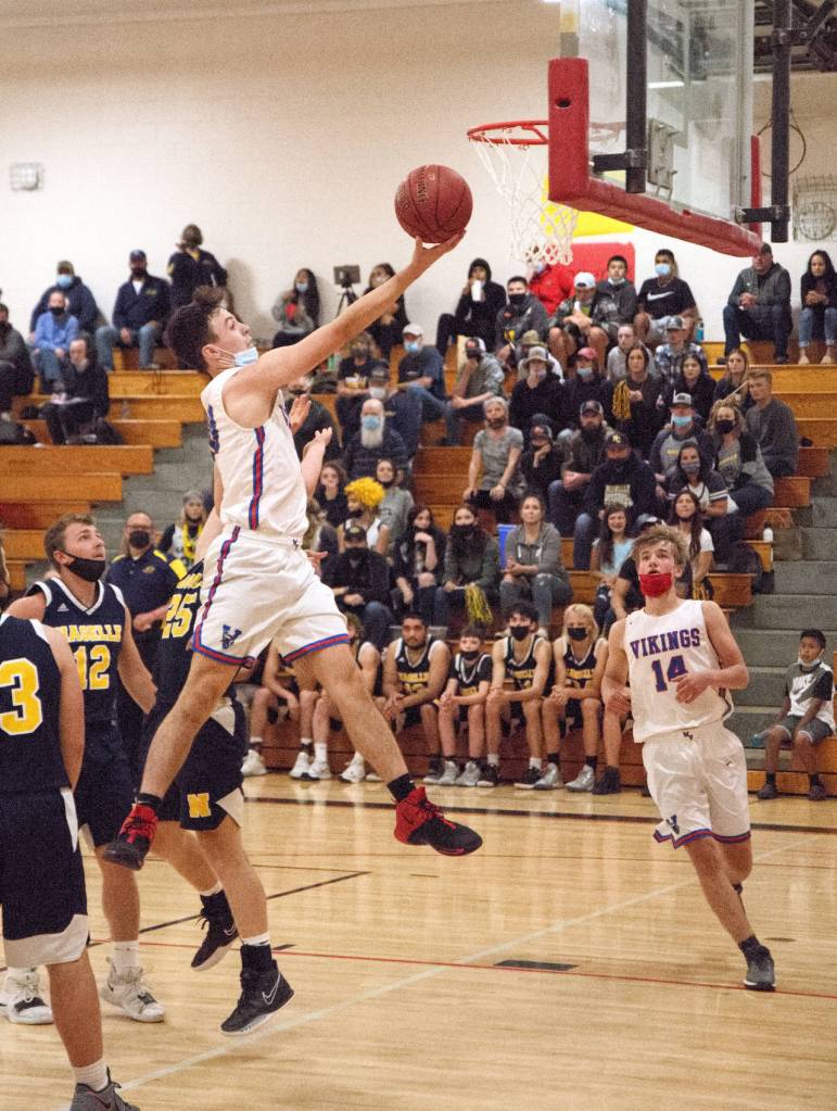 RYAN SPARKS | THE DAILY WORLD Willapa Valley senior Joseph Pulsipher glides to the hoop in the first half of the Vikings 66-51 loss to Naselle in the 1B District 4 Championship game on Tuesday in Oakville.
