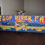 DAN HAMMOCK | THE DAILY WORLD 
Jeff Hammers brought the original 1971 Satsop River Fair and Tin Cup Race rock festival banner to the D&R Events Center in Aberdeen on Wednesday. At left is Randy Beerbower from the Chehalis Valley Historical Society, and at right is John Kirkwood, who attended the festival.