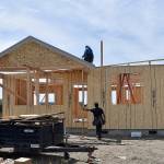 DAN HAMMOCK | THE DAILY WORLD
A two-man crew works on a new single family home on Fairwood Drive SW in Ocean Shores, one of dozens of new builds popping up in the city every month.