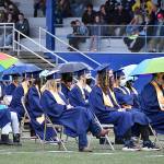 DAN HAMMOCK | THE DAILY WORLD
Umbrellas popped up on several occasions as rain dampened the graduation ceremony