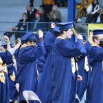 DAN HAMMOCK | THE DAILY WORLD
Members of the Aberdeen High School Class of 2021 move their tassels to the left, signifying their graduation, at the end of the ceremony Friday evening at Stewart Field.