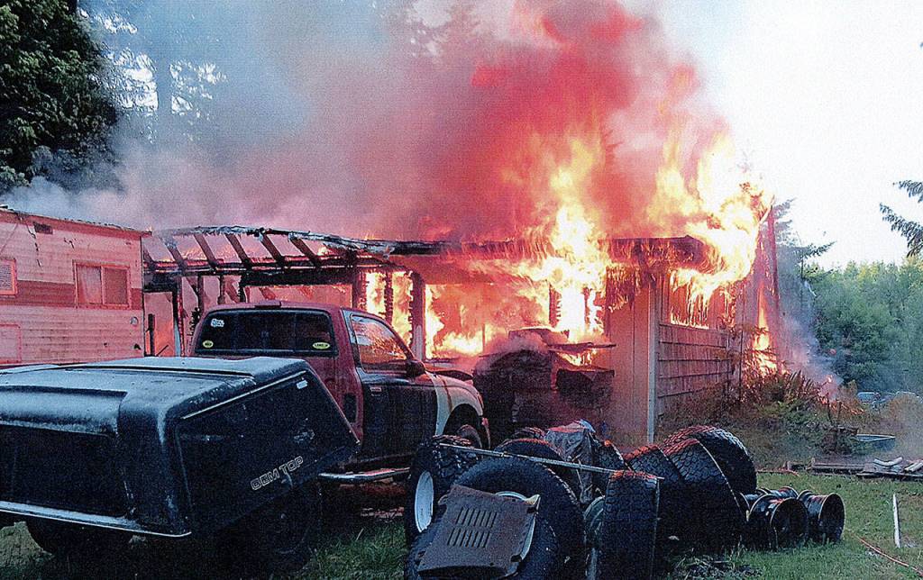 A woman was found dead after a house fire on Valley Road north of Grays Harbor City early Monday morning. (Courtesy Grays Harbor Fire District 6)