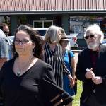 DAN HAMMOCK | THE DAILY WORLD 
Joint Pacific County Housing Authority Executive Director Jennifer Westerman leads Raymond Mayor Tony Nordin to the podium at the groundbreaking ceremony for the Willapa Center in Raymond Thursday.