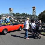 DAN HAMMOCK | THE DAILY WORLD 
Situated between the classic cars and the Hoquiam Pushrods River Run Revival car show registration booth on Levee Street on Saturday was the popular Trash and Treasure table with lots of items to be auctioned toward the end of the show.