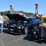 DAN HAMMOCK | THE DAILY WORLD 
A little something for everyone who loves cars was at the Hoquiam Pushrods River Run Revival car show on Levee Street Saturday. In the foreground is a 1932 Pontiac registered to David Rowe of South Bend. Its sitting next to a newer model Shelby.