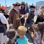 DAN HAMMOCK | THE DAILY WORLD 
The Columbia River Association of Pirates, who call themselves the C.R.A.P. Crew, recruit new crew members at Rusty Scuppers Pirate Daze in Westport on Saturday.