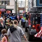 DAN HAMMOCK | THE DAILY WORLD 
The crowd in the vendors area on Broadway Street made way for a couple of the parades Jeep club members to park their rides among the food and product booths at the Founders Day celebration in Aberdeen on Saturday.