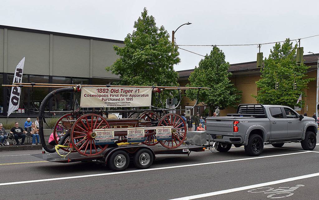 DAN HAMMOCK | THE DAILY WORLD 
Cosmopolis first fire apparatus, the 1882 Old Tiger #1, made its way down Market Street in the Aberdeen Founders Day parade.