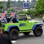 DAN HAMMOCK | THE DAILY WORLD 
The Single Jeepers, a group of single Jeep enthusiasts, had several rigs in the Aberdeen Founders Day parade Saturday, including this one outfitted in Seahawks blue and green.
