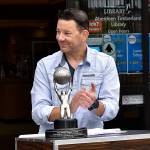 DAN HAMMOCK | THE DAILY WORLD 
Author Jeff Burlingame brought his NAACP Image Award to a ceremony Saturday dedicating a star in his honor on the Aberdeen Walk of Fame.