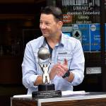 DAN HAMMOCK | THE DAILY WORLD 
Author Jeff Burlingame brought his NAACP Image Award to a ceremony Saturday dedicating a star in his honor on the Aberdeen Walk of Fame.