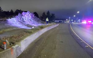 Courtesy Aberdeen Police Department 
Orange paint on the concrete wall in front of the Breaker concrete monument on North Park Street shows where a vehicle struck before becoming airborne and rolling down the roadway, coming to rest more than 100 yards down the road. A 20-year-old South Aberdeen woman was killed in the early Saturday morning wreck.