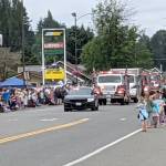 DAVE HAVILAND | THE DAILY WORLD 
Police and fire department vehicles led the 62nd Annual Grand Parade on Saturday.