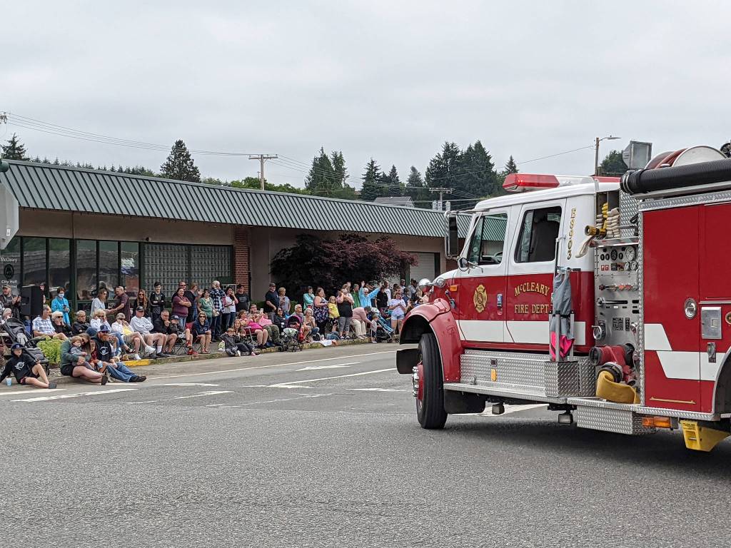 DAVE HAVILAND | THE DAILY WORLD 
The McCleary Fire Department truck rounds the corner onto 3rd Street during the 62nd Annual Grand Parade this year.