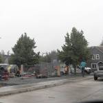 DAVE HAVILAND | THE DAILY WORLD 
A Bellevue-based company removes the fencing surrounding the homeless camp adjacent to Aberdeen City Hall Friday morning. The camp, known as TASL, was closed at noon Friday.