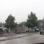 DAVE HAVILAND | THE DAILY WORLD 
A Bellevue-based company removes the fencing surrounding the homeless camp adjacent to Aberdeen City Hall Friday morning. The camp, known as TASL, was closed at noon Friday.