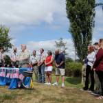 DAVE HAVILAND | THE DAILY WORLD 
Left to Right: Families of Eagle Scouts Foster Daniel Patterson, Alexzander Lee Tomko, and Navarree Dyllon Reid-Dickson supporting their scouts during the ceremony.
